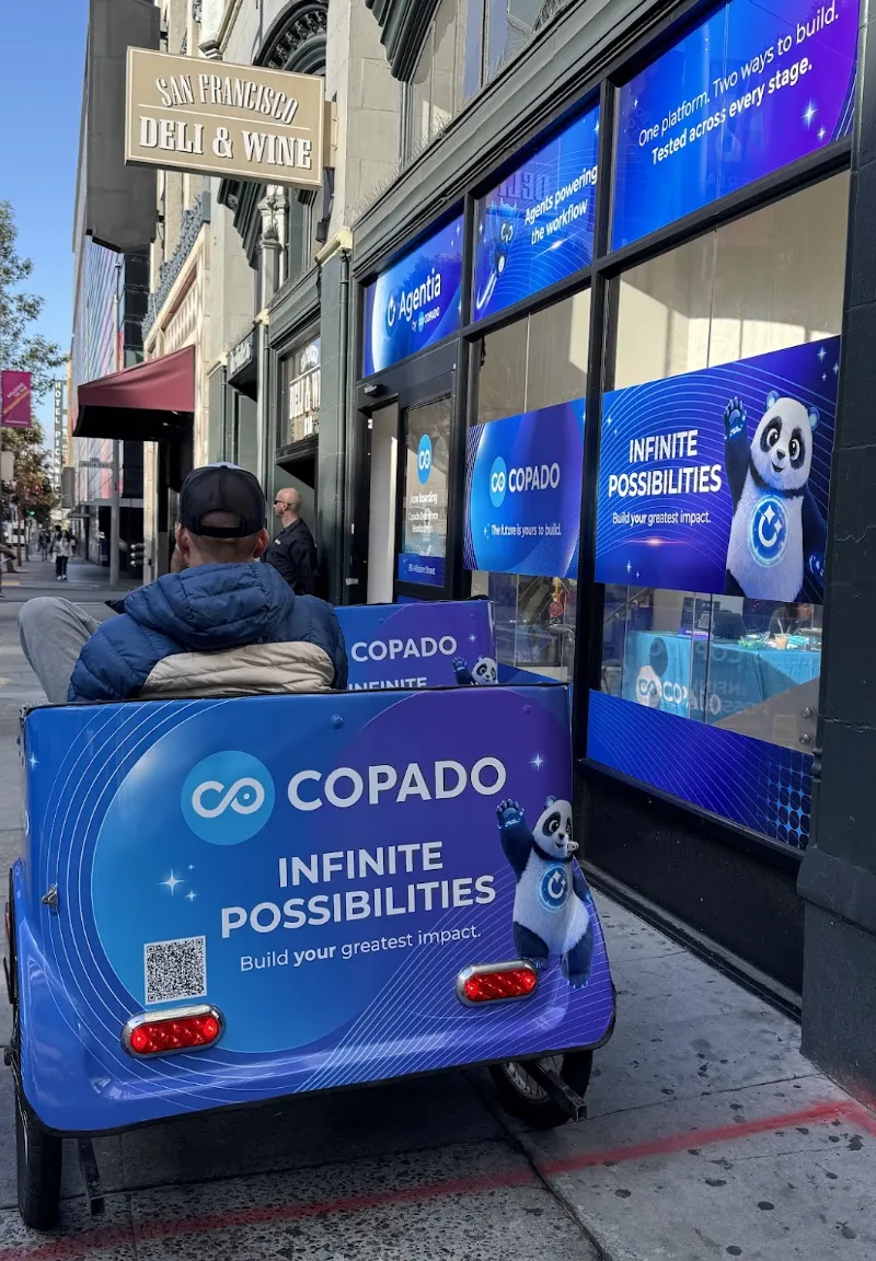 Copado-branded pedicab outside Copado Dreamforce HQ