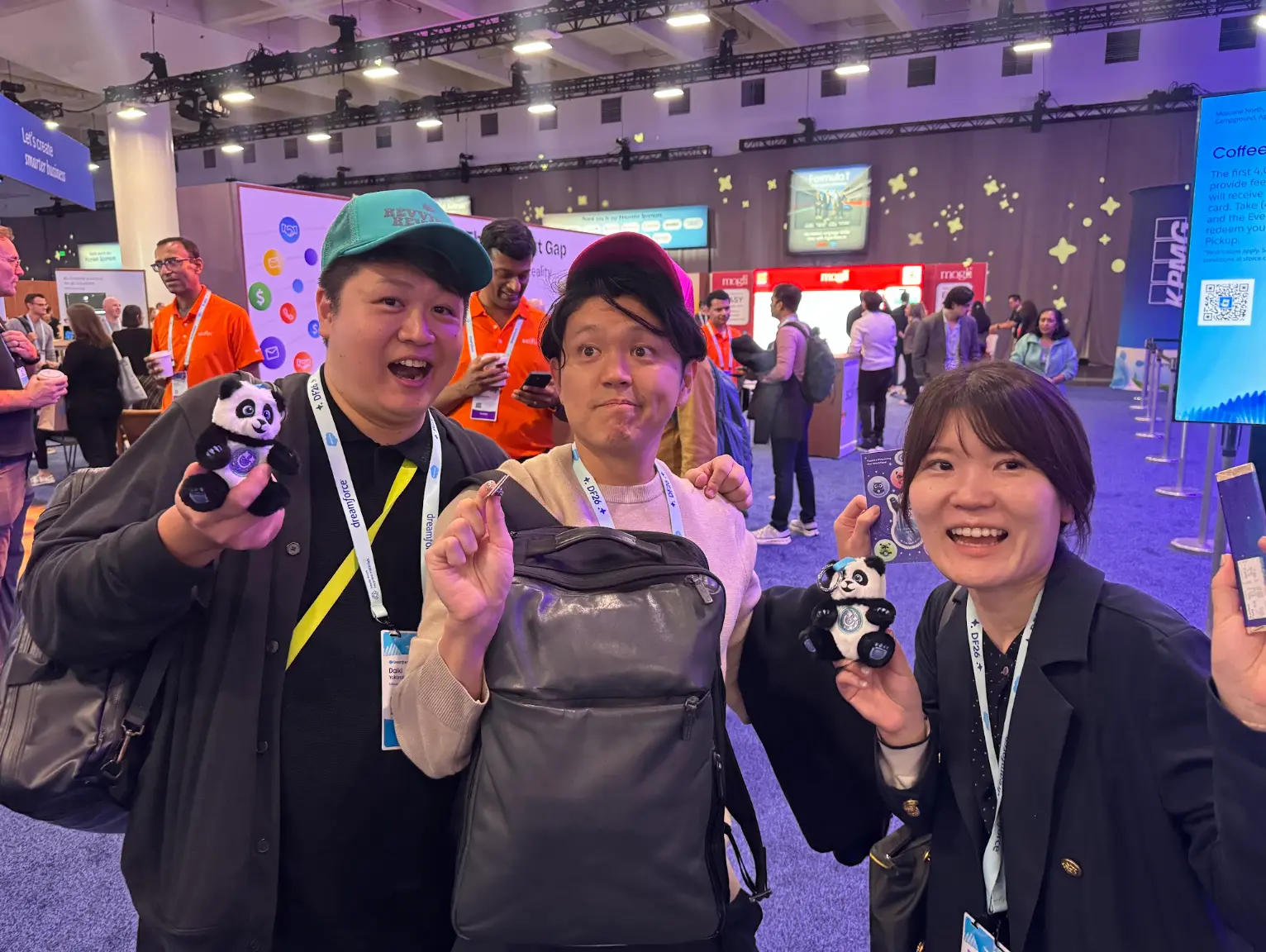Attendees with Copado panda plushies at Campground Expo