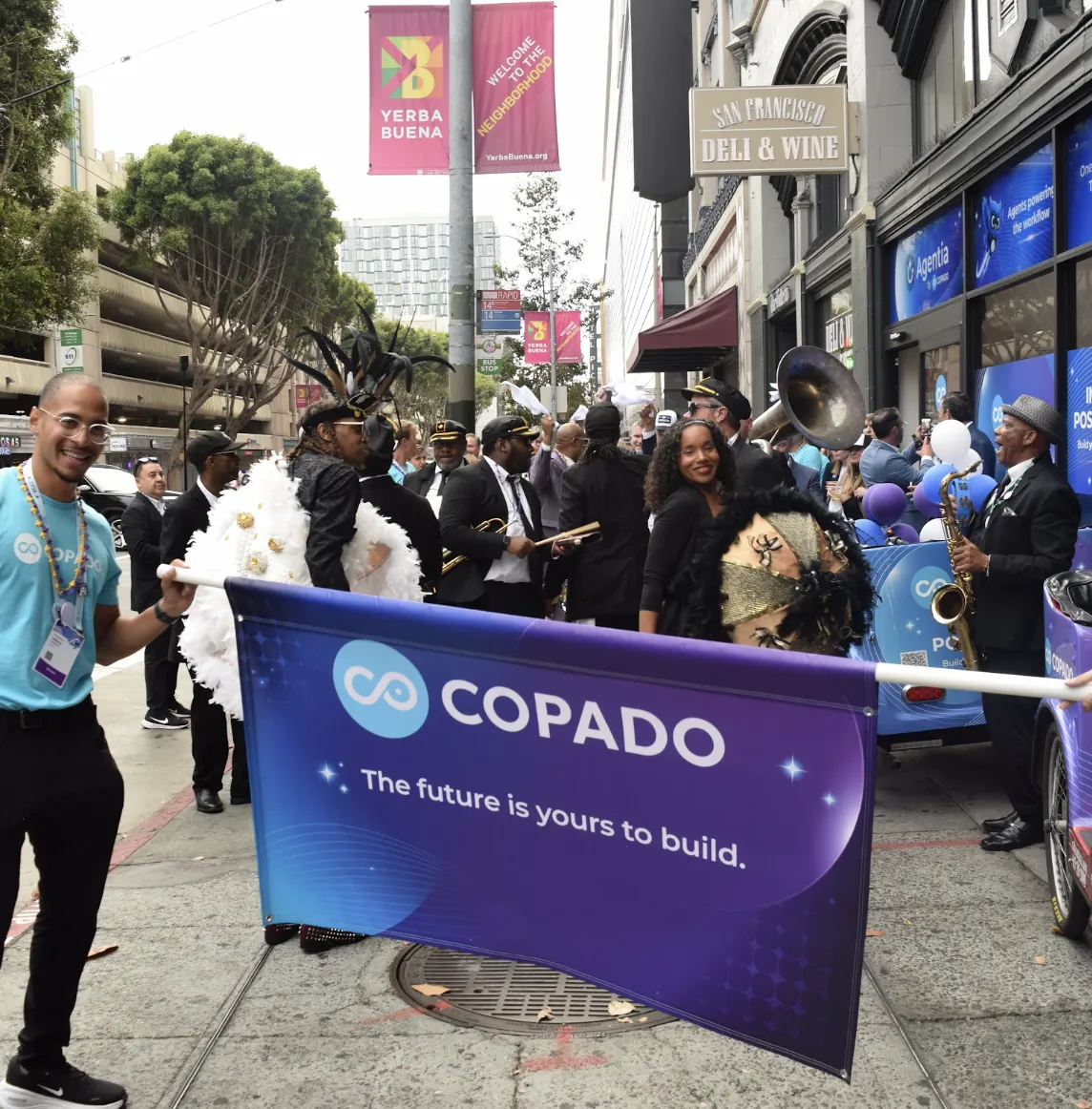 Copado banner leading the brass band parade